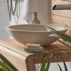 Bílé kulaté terrazzo umyvadlo na desku Kave Home Delina 40 cm -fv-interier-25